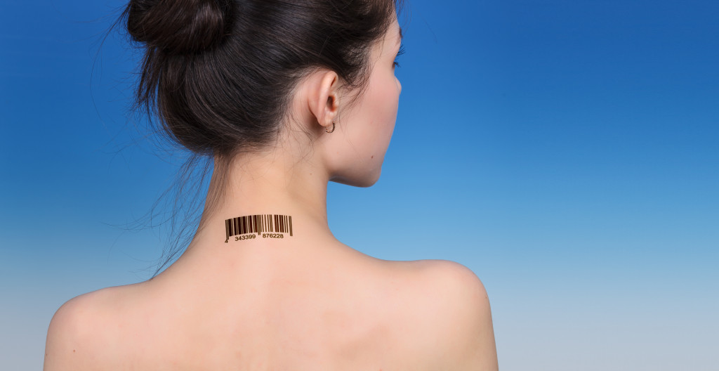 Girl with a bar code on her neck, the protection personal data